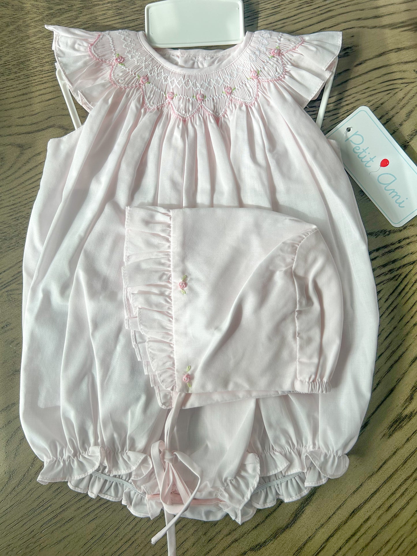 Hand smocked light pink heirloom bubble with bonnet