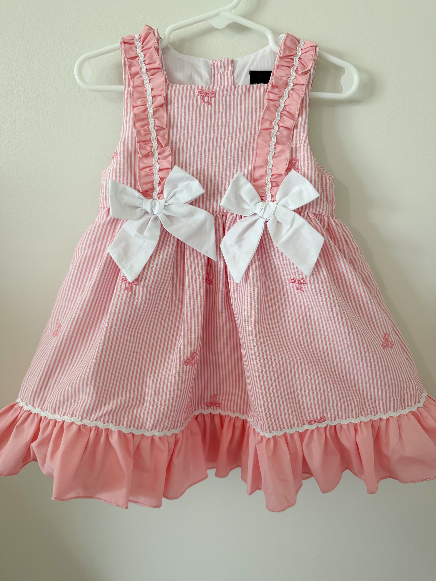 Pink seersucker dress wirh Embrodiered bows
